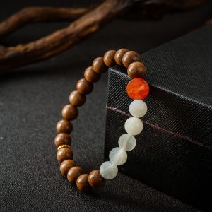 Good Fortune | Six-Path Wood & Moonstone Bracelet - Six-Path wood, moonstone, dragon-scale agate, gold-finished silver bracelet product photograph