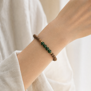 Half Mountain | Agarwood & Hetian Jade Bracelet - Agarwood, Hetian green jade, gold-finished silver bracelet product photograph